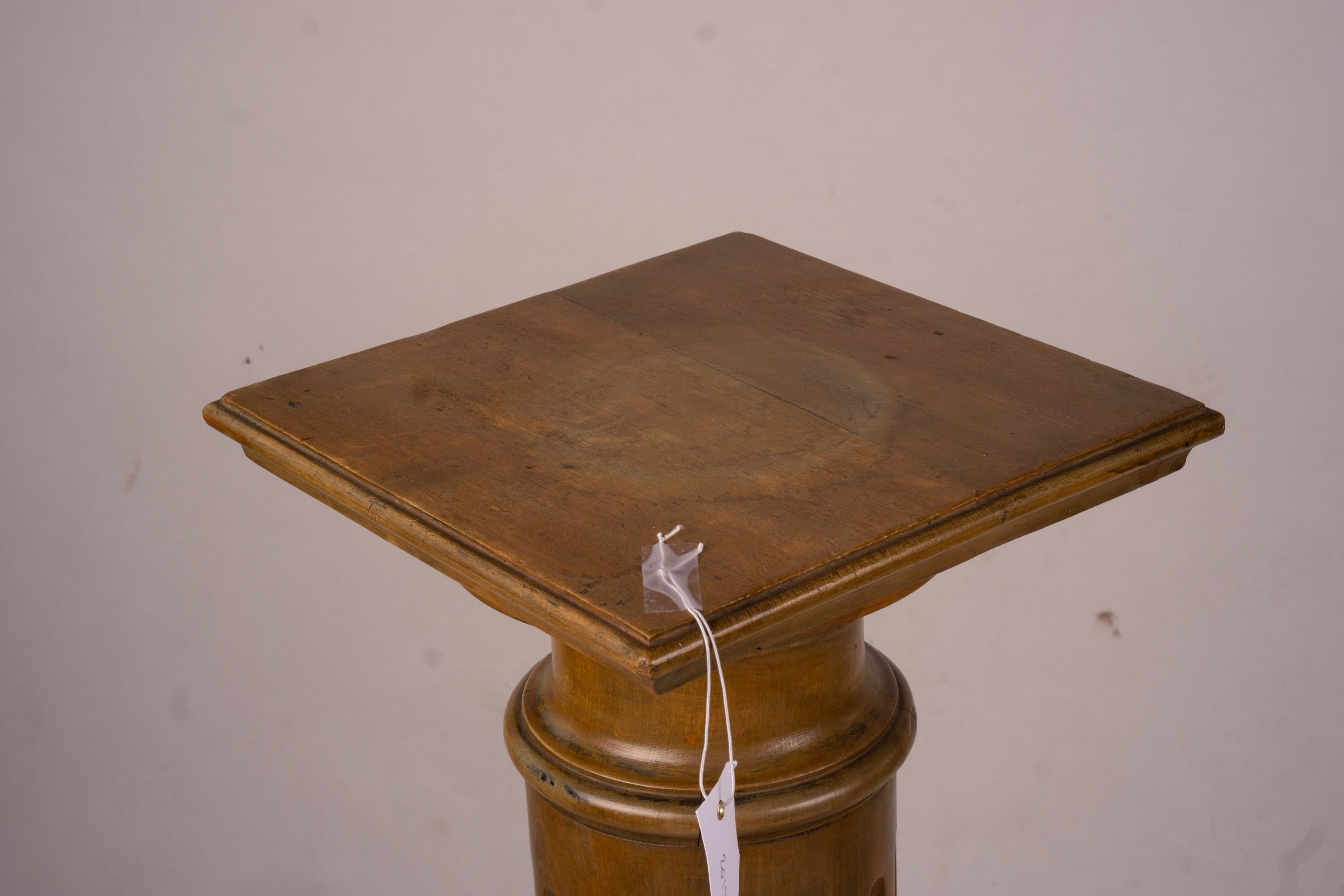 A pair of Victorian style carved beech and walnut pedestals, height 110cm